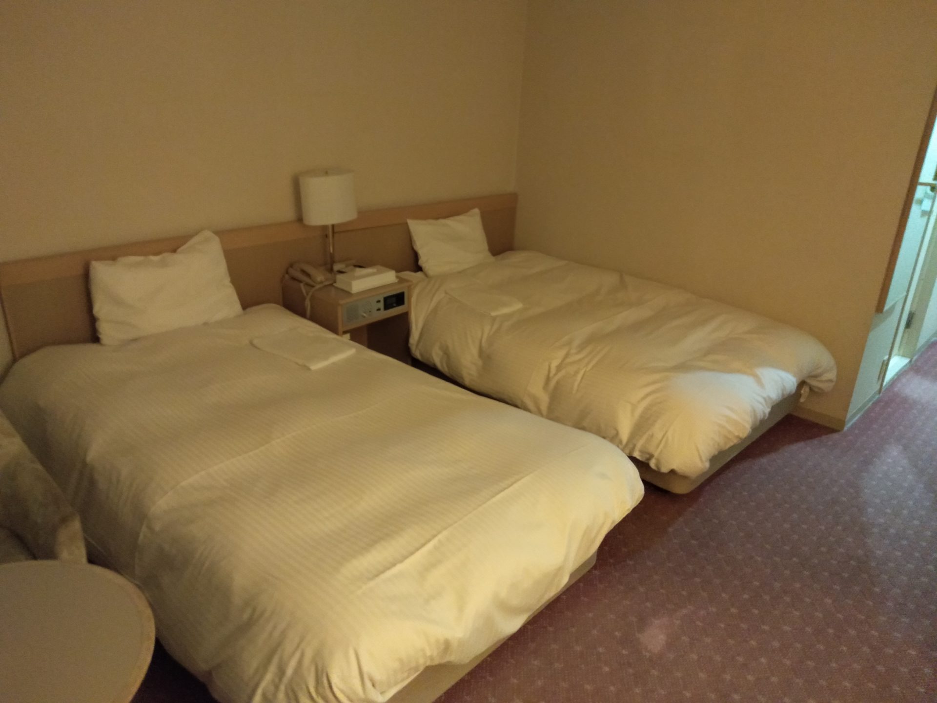 センチュリープラザホテル　室内　ベッド